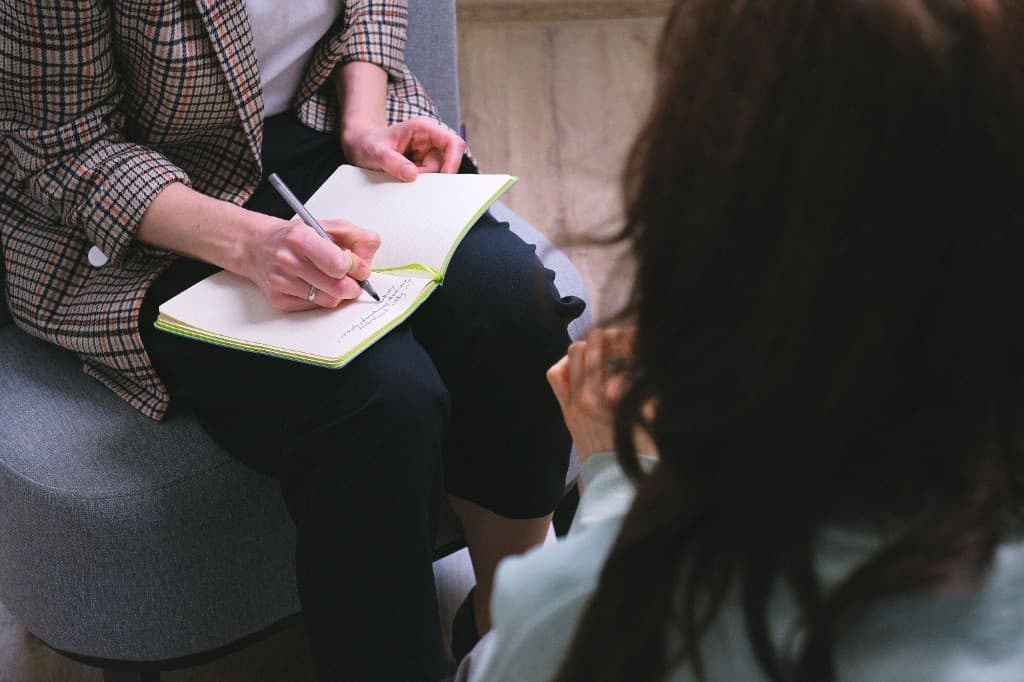 Séance de coaching individuel : écoute et prise de notes